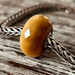 TROLLBEADS Cats Eye Quartz Facet LAA 925 NEW Condition Stellar Flash Amber Color